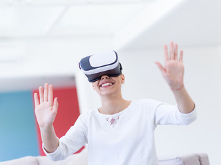 Image showing woman using VR-headset glasses of virtual reality