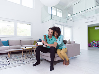 Image showing Multiethnic Couple using virtual reality headset