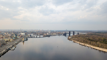 Image showing The embankment near the river port, Church of St. Nicholas the Wonderworker in the waters , Havanskyi and Podolsky bridges in Kiev city Ukraine.