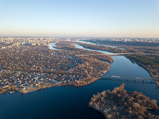 Image showing Landscape view of the left bank of Kiev with the Dnieper River against the blue sky