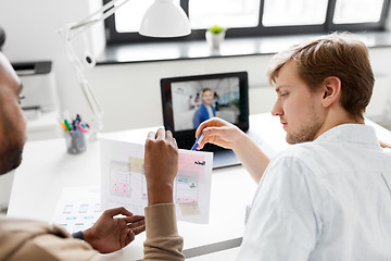 Image showing creative team having video conference at office