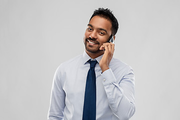 Image showing indian businessman calling on smartphone