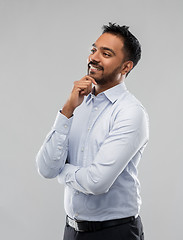 Image showing indian businessman in shirt over grey background