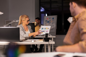 Image showing designers or software developers at night office