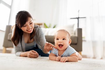 Image showing happy little asian baby boy with mother at home