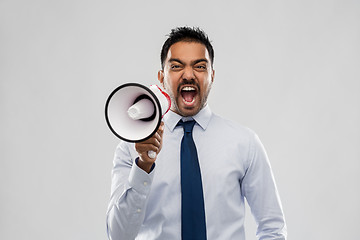 Image showing indian businessman screaming over grey