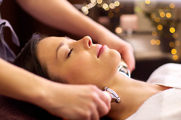 Image showing woman having hydradermie facial treatment in spa