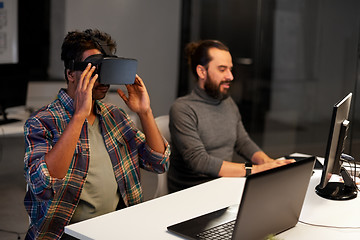 Image showing creative man in virtual reality headset at office