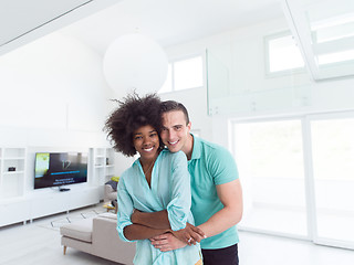 Image showing multiethnic couple hugging