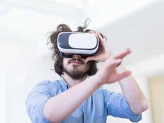 Image showing man using VR-headset glasses of virtual reality