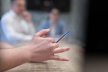 Image showing businessman hand using pen