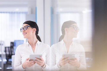 Image showing Business Woman Using Digital Tablet in front of startup Office