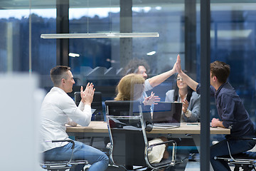 Image showing startup Group of young business people celebrating success