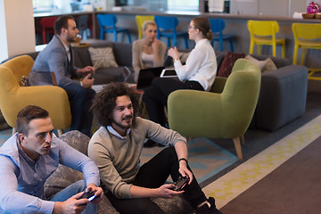 Image showing startup Office Workers Playing computer games