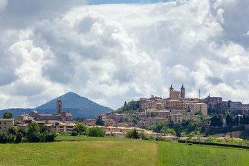 Image showing Camerino in Italy Marche over colourful fields