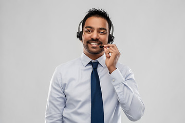 Image showing indian businessman or helpline operator in headset