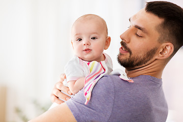 Image showing father with little baby girl at home