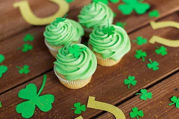 Image showing green cupcakes, horseshoes and shamrock