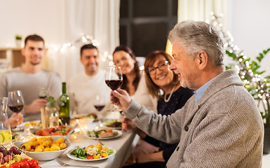 Image showing happy family having dinner party at home