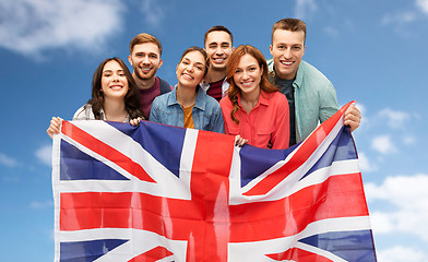 Image showing group of smiling friends with british flag