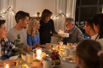 Image showing happy family having birthday party at home