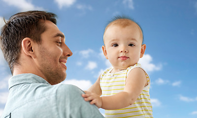 Image showing father with little baby daughter at home