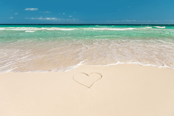 Image showing tropical beach with heart on sand