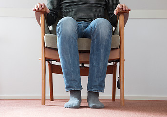 Image showing Man in armchair, slightly creepy 