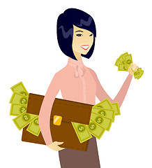 Image showing Asian business woman with briefcase full of money.