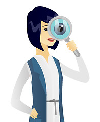 Image showing Young asian business woman with magnifying glass.