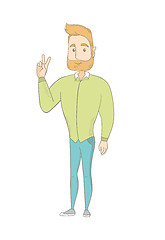 Image showing Caucasian hippie man showing victory gesture.