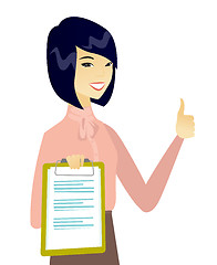 Image showing Business woman with clipboard giving thumb up.