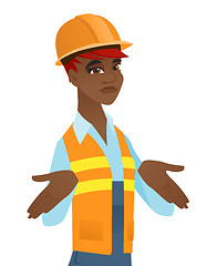 Image showing Confused african builder shrugging shoulders.