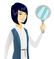 Image showing Young asian business woman with magnifier.