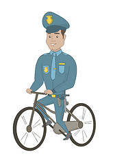 Image showing Young hispanic police officer on bicycle.