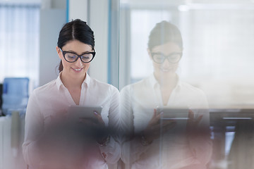 Image showing Business Woman Using Digital Tablet in front of startup Office