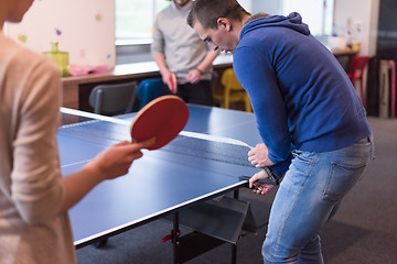 Image showing startup business team playing ping pong tennis