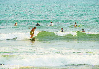 Image showing Crowded Bali surfing line-up. Indonesia