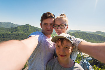 Image showing Selfie of family in mountain