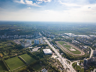 Image showing Aerial view landscape of the city of Kiev with a racecourse on a background of blue sky