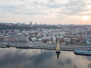 Image showing Kiev, Ukraine: 15 April, 2018 - Church of St. Nicholas the Wonderworker on Dnieper River on sunset, photography from drone