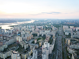 Image showing A bird\'s eye view, aerial panoramic view from drone to the Darnyts\'kyi district of Kiev, Ukraine and view to the right bank of Dnieper at sunset in the summer.