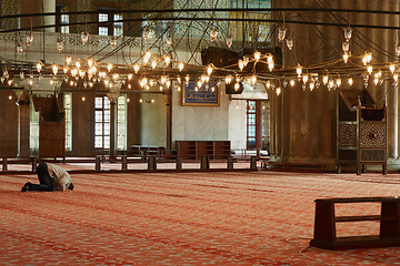 Image showing male Muslim praying in the mosque