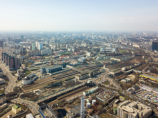 Image showing Panoramic view of the city of Kiev with modern high-rise buildings and a railway station