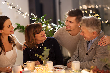 Image showing happy family having tea party at home