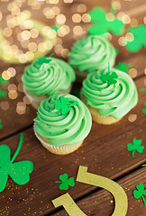 Image showing green cupcakes, horseshoes and shamrock