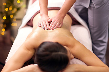 Image showing woman having back massage with gel at spa
