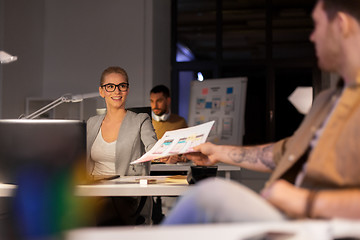 Image showing designers or software developers at night office