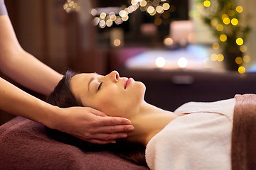 Image showing woman having face and head massage at spa