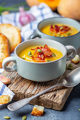 Image showing Delicious pumpkin soup with bacon.